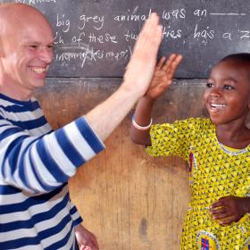 Andrew Morley meets sponsored child Ivy