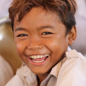 Khmer boy laughing at the camera