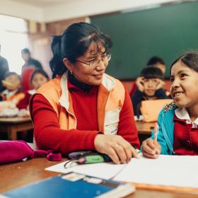 World Vision staff with a child