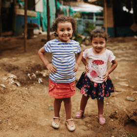 Sisters power pose in Colombia