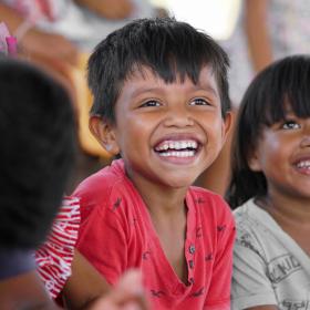 Two children smiling