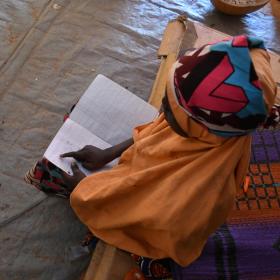 Child works on her homework