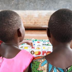 two children work on homework