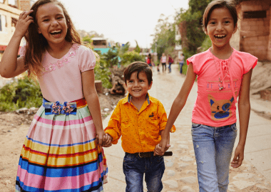 Children walking and holding hands