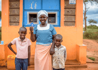 Mother with two children Grundfos Wrold Vision Partnership