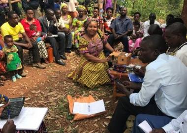 Women and men saving together in Rwanda. Angeline Munzara/World Vision
