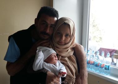 A new life arrives in Serbia - Ola and her husband Kaisar with baby Omar