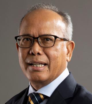 Guntur Tampubolon headshot