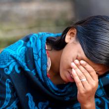 Lucky cries as she shares her story in Bangladesh